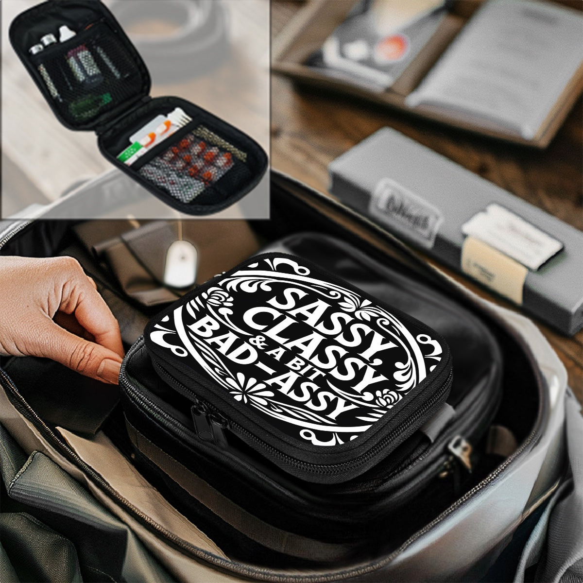 Small black pouch with 'Sassy Bad & Sassy' text, opened to reveal items inside, on a wooden surface.